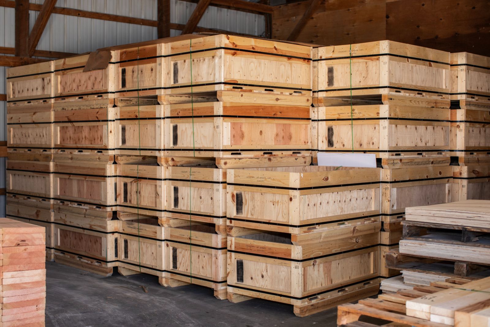 custom wood boxes stacked in a warehouse